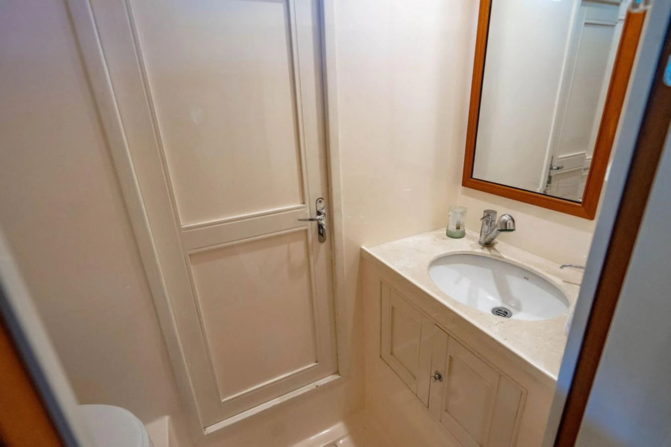 a bathroom with a shower and sink aboard NEVER BETTER Yacht for Sale