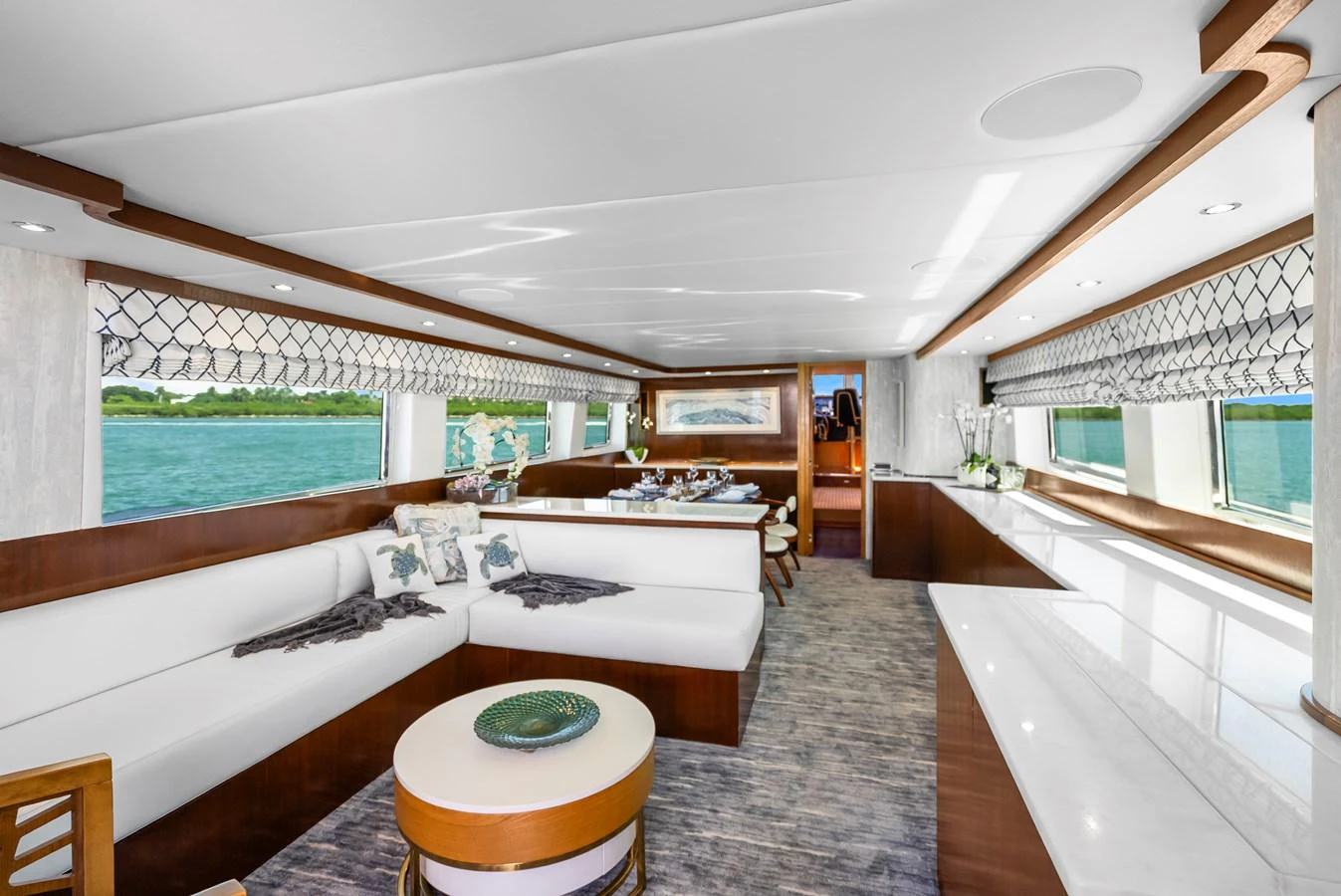 a large room with a bed and a bathtub aboard AZURE Yacht for Sale