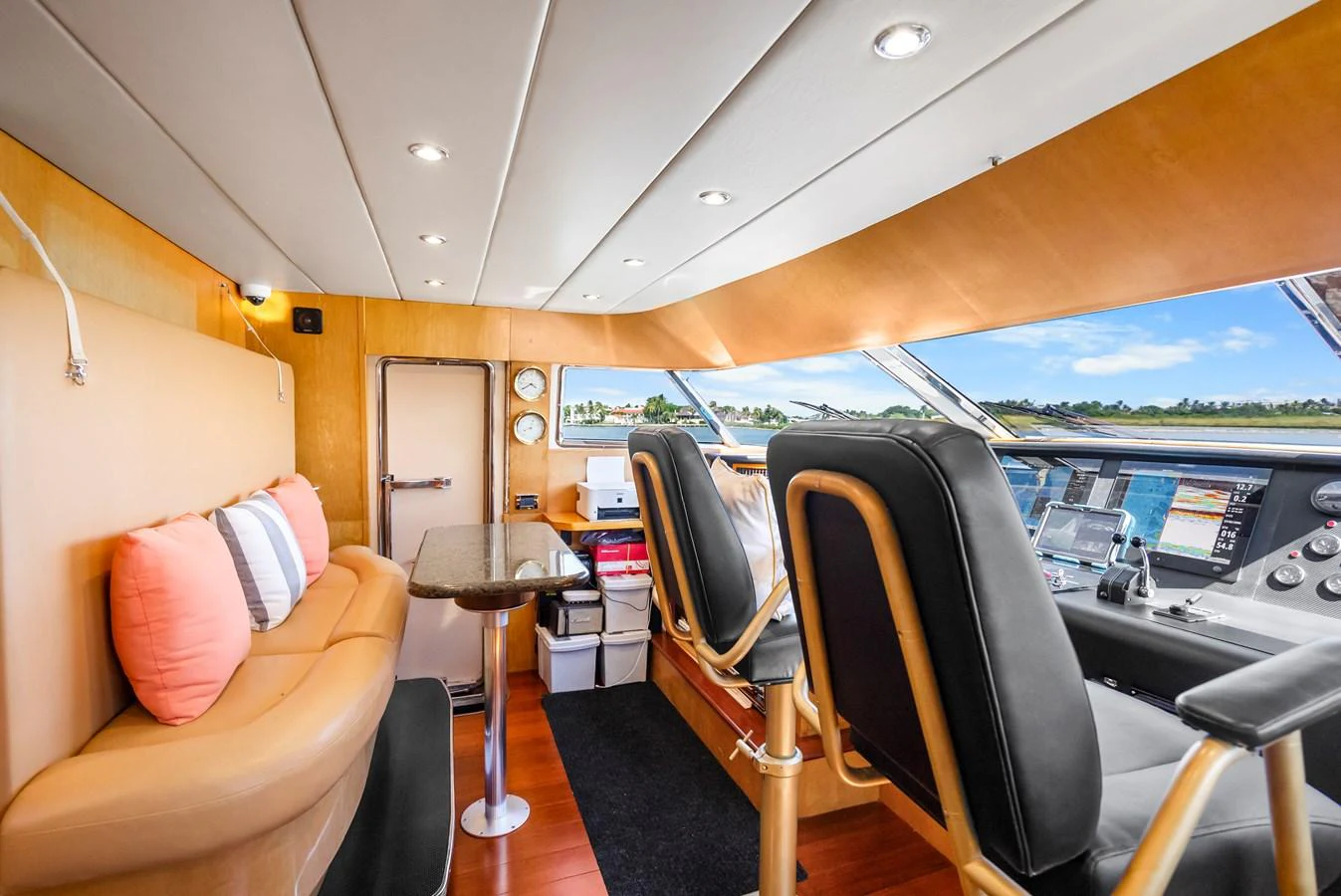 inside of a vehicle with a view of the water and the land below aboard AZURE Yacht for Sale
