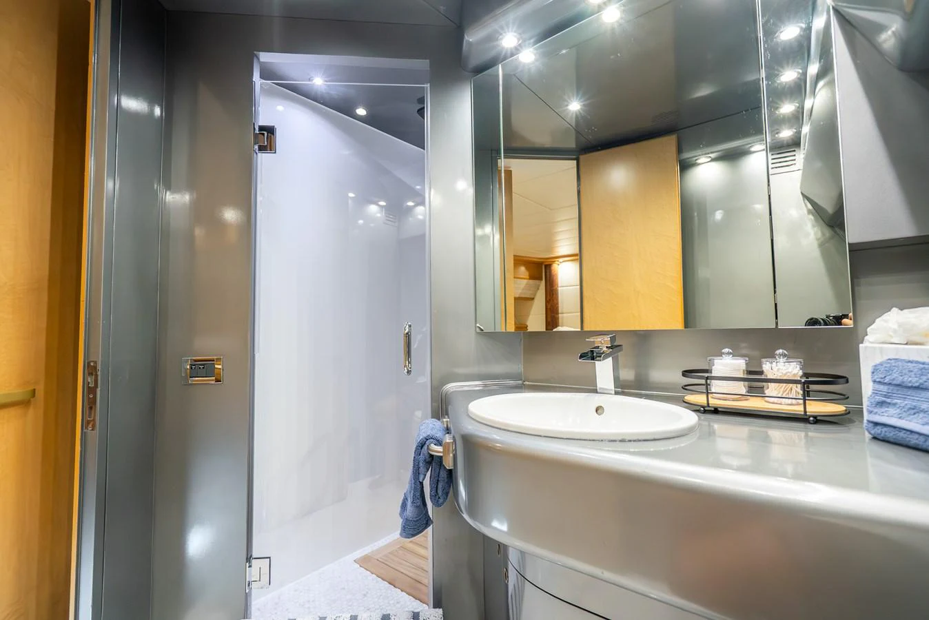 a bathroom with a large mirror aboard AZURE Yacht for Sale