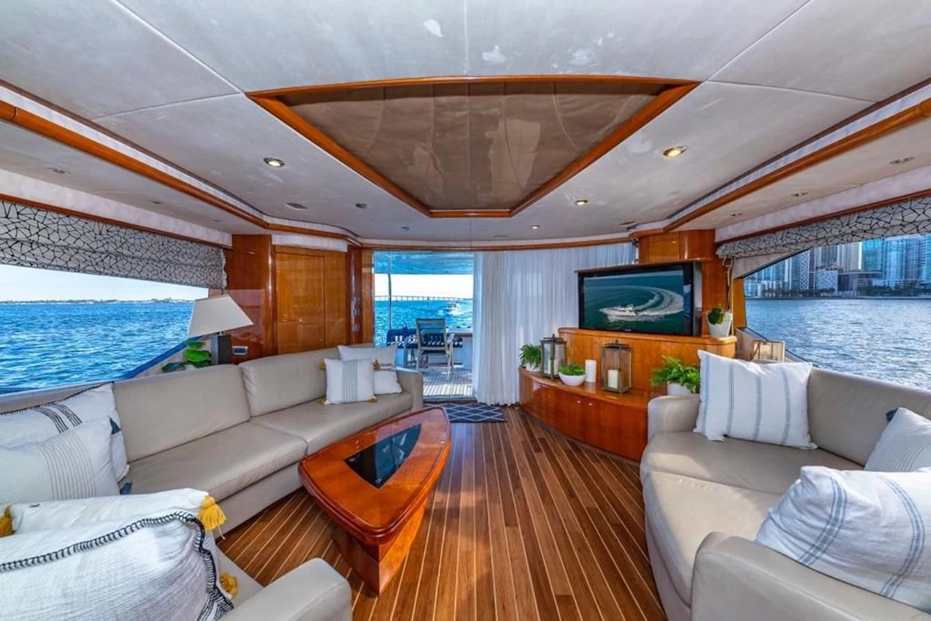 a living room with a large window aboard ALAINA Yacht for Sale