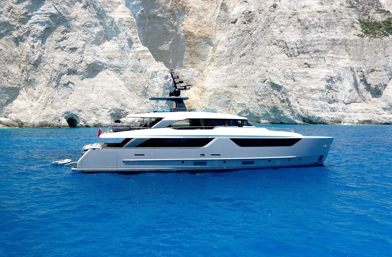 a white boat in the water aboard MOUCHKA Yacht for Sale