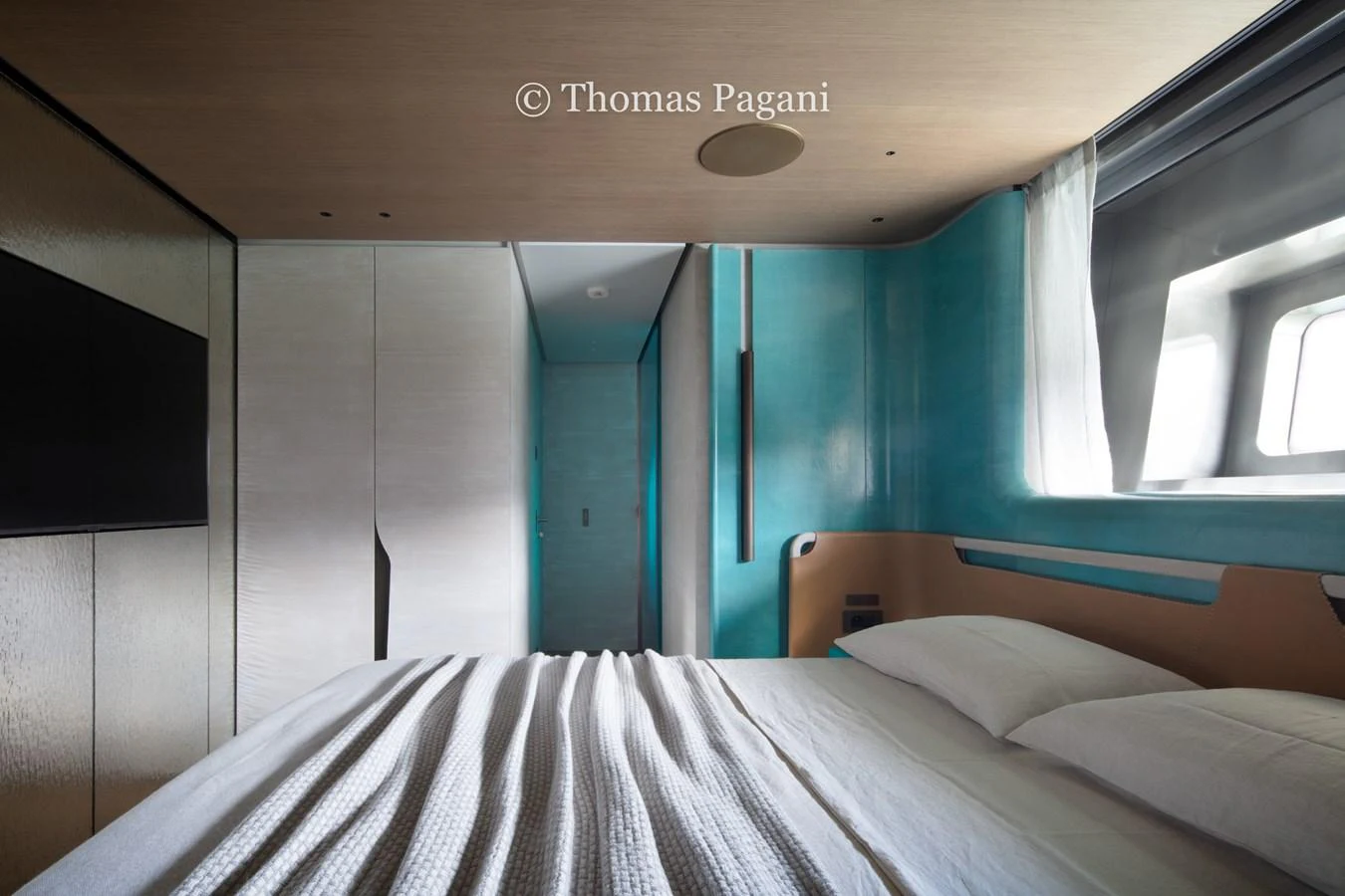 a room with a bed and a window aboard MOUCHKA Yacht for Sale