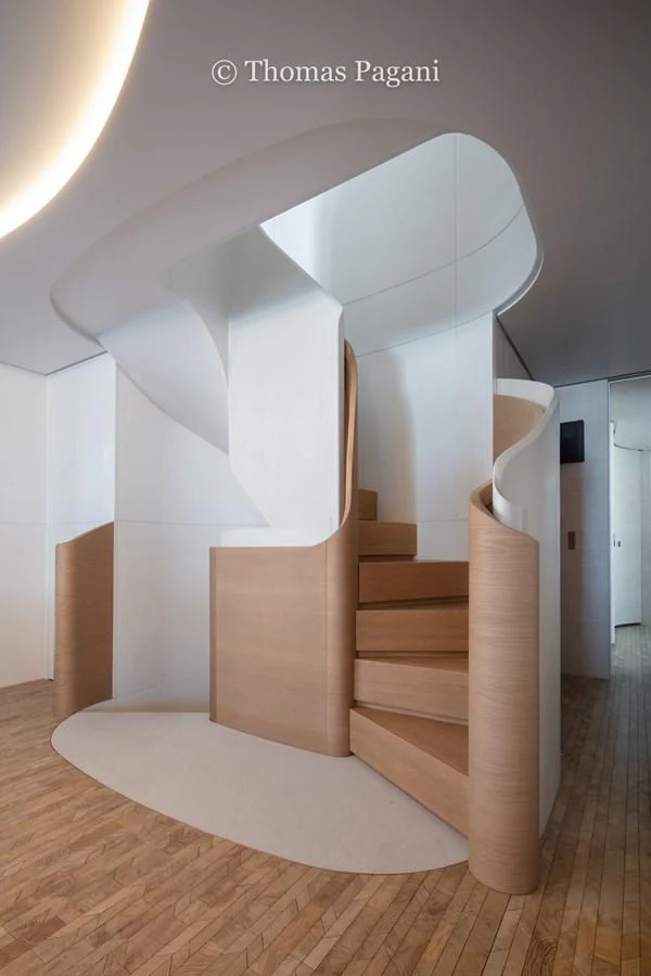 a staircase with white walls aboard MOUCHKA Yacht for Sale