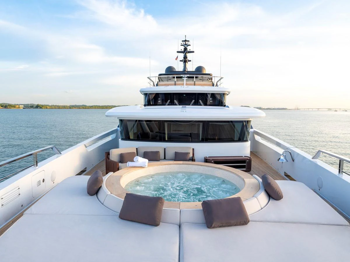 The sundeck features a luxurious jacuzzi surrounded by comfortable lounging areas, perfect for relaxation. aboard ANNABELLA Yacht for Sale