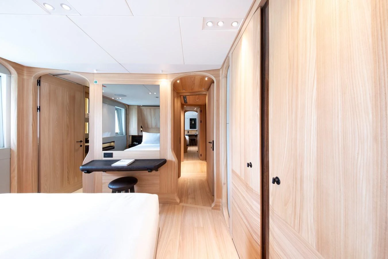 The stateroom features elegant wood paneling and a serene ambiance. aboard ANNABELLA Yacht for Sale
