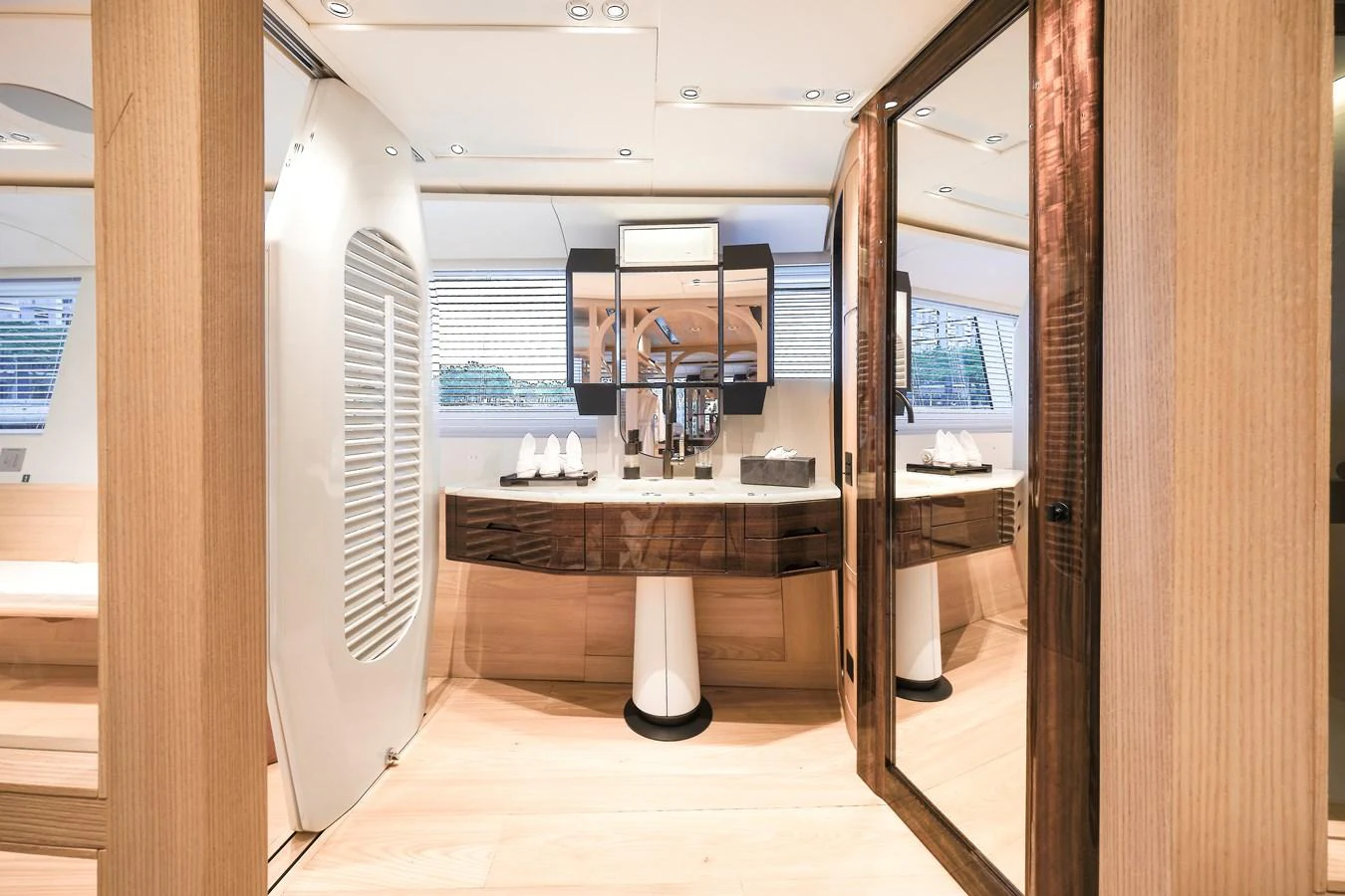 This luxurious yacht bathroom features modern fixtures and ample natural light. aboard ANNABELLA Yacht for Sale