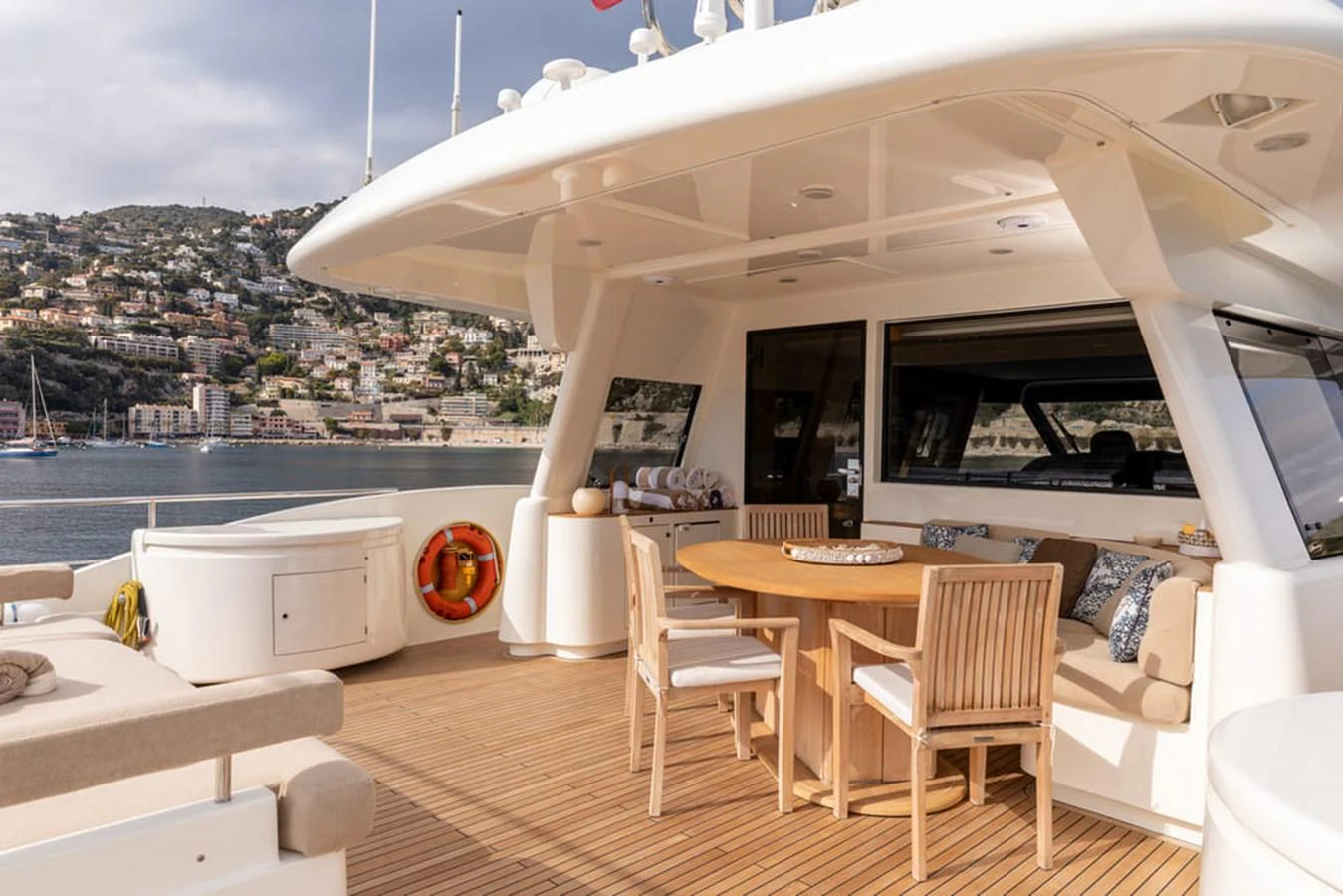 a room with a table and chairs aboard LA PAUSA Yacht for Sale