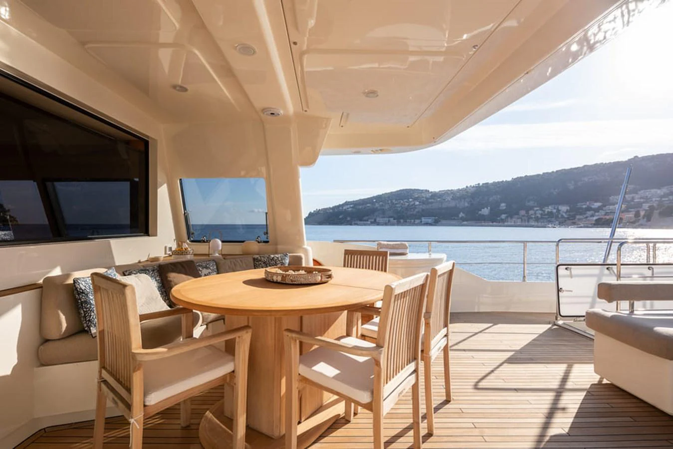 a table and chairs on a deck aboard LA PAUSA Yacht for Sale