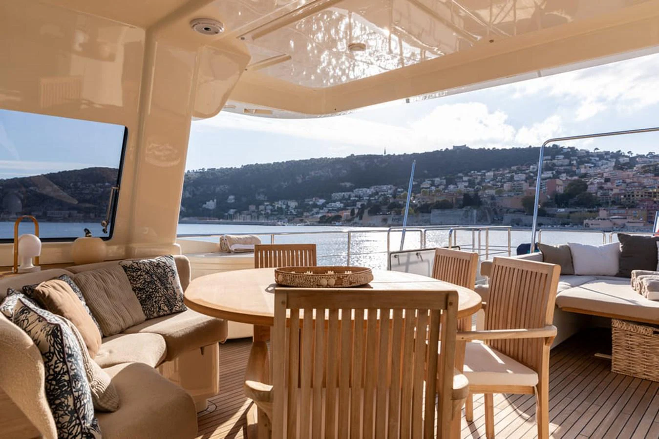 a room with a table and chairs aboard LA PAUSA Yacht for Sale