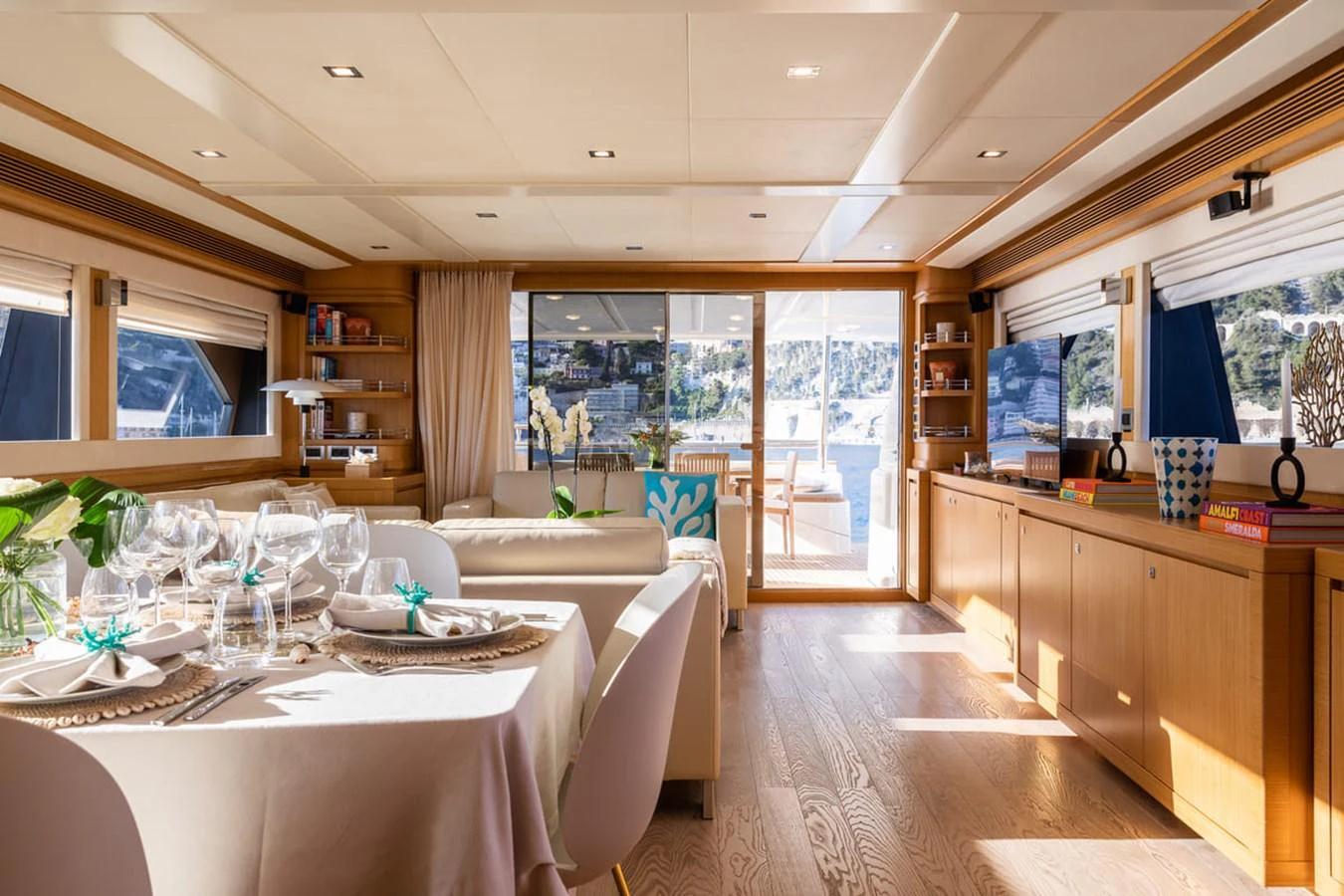 a large kitchen with a table and chairs aboard LA PAUSA Yacht for Sale
