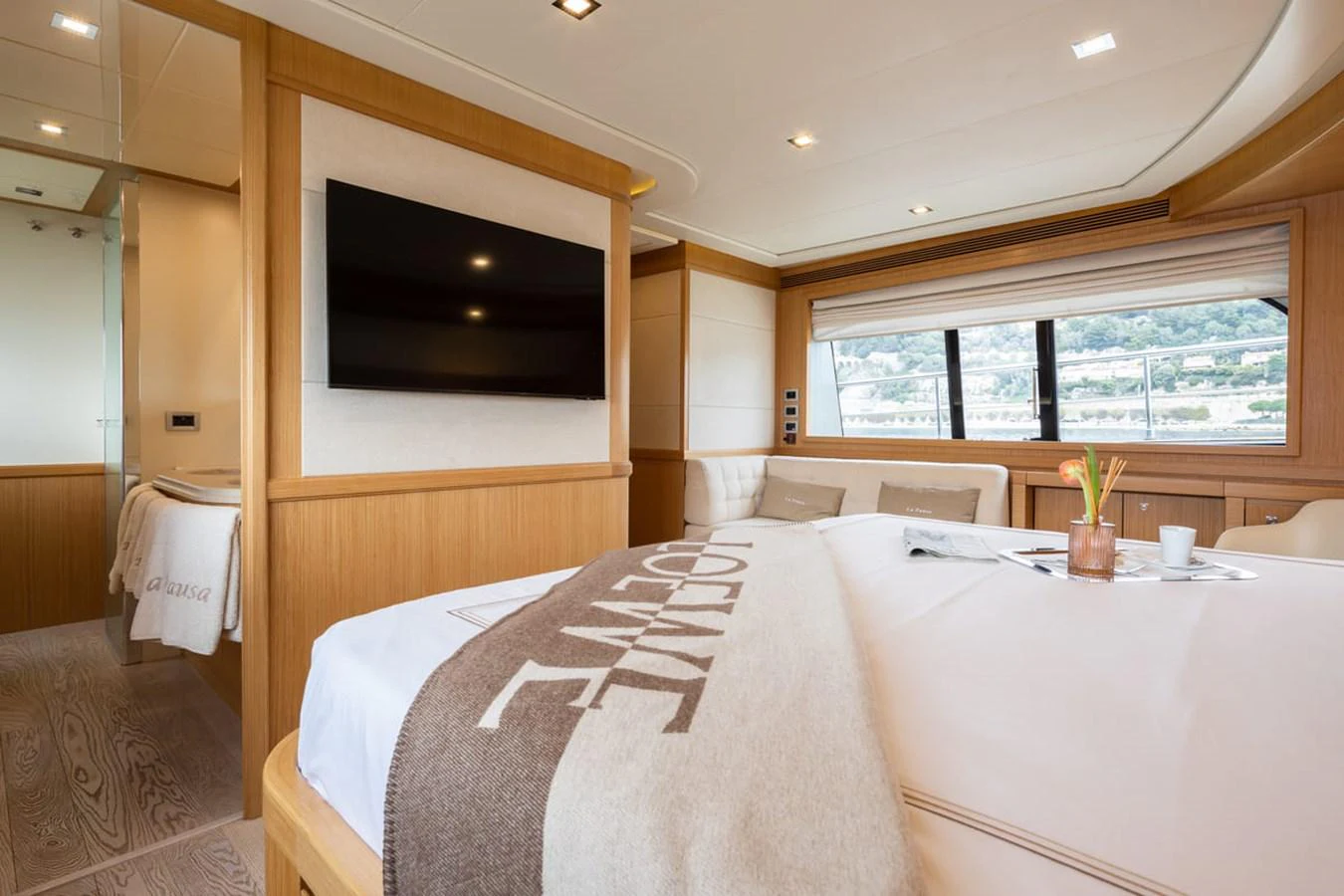 a bed with a white sheet aboard LA PAUSA Yacht for Sale