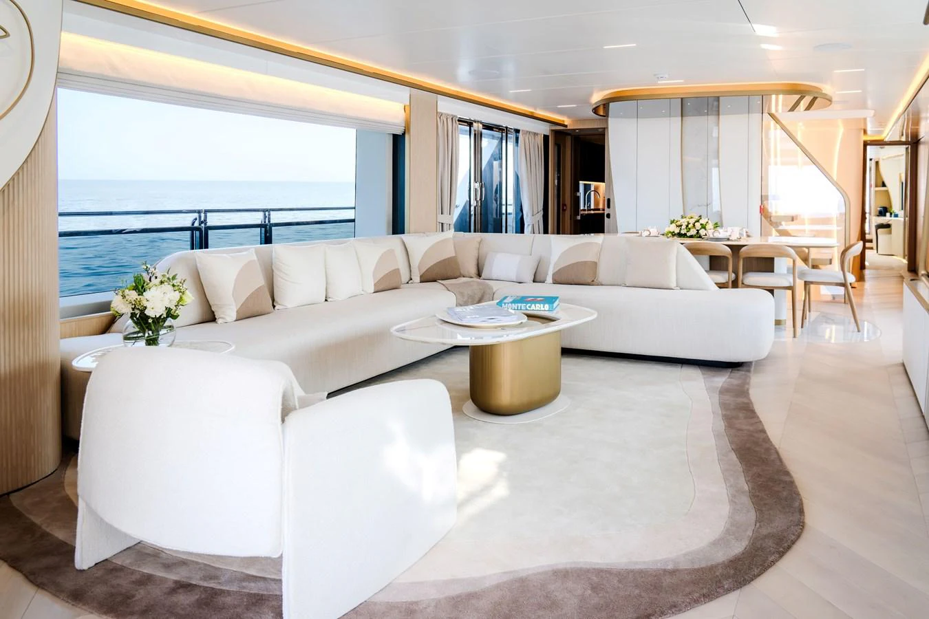 The salon features a spacious and elegantly designed seating area with panoramic ocean views. aboard 100 TERRACE ON-ORDER Yacht for Sale