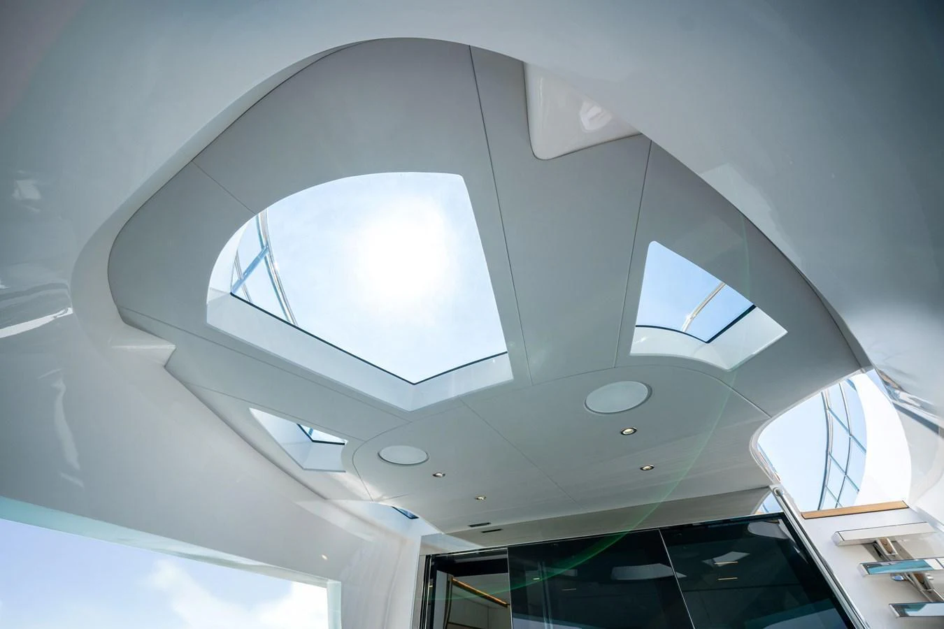 The yacht features a sleek and modern ceiling design with large skylights that allow natural light to flood the interior. aboard 100 TERRACE ON-ORDER Yacht for Sale