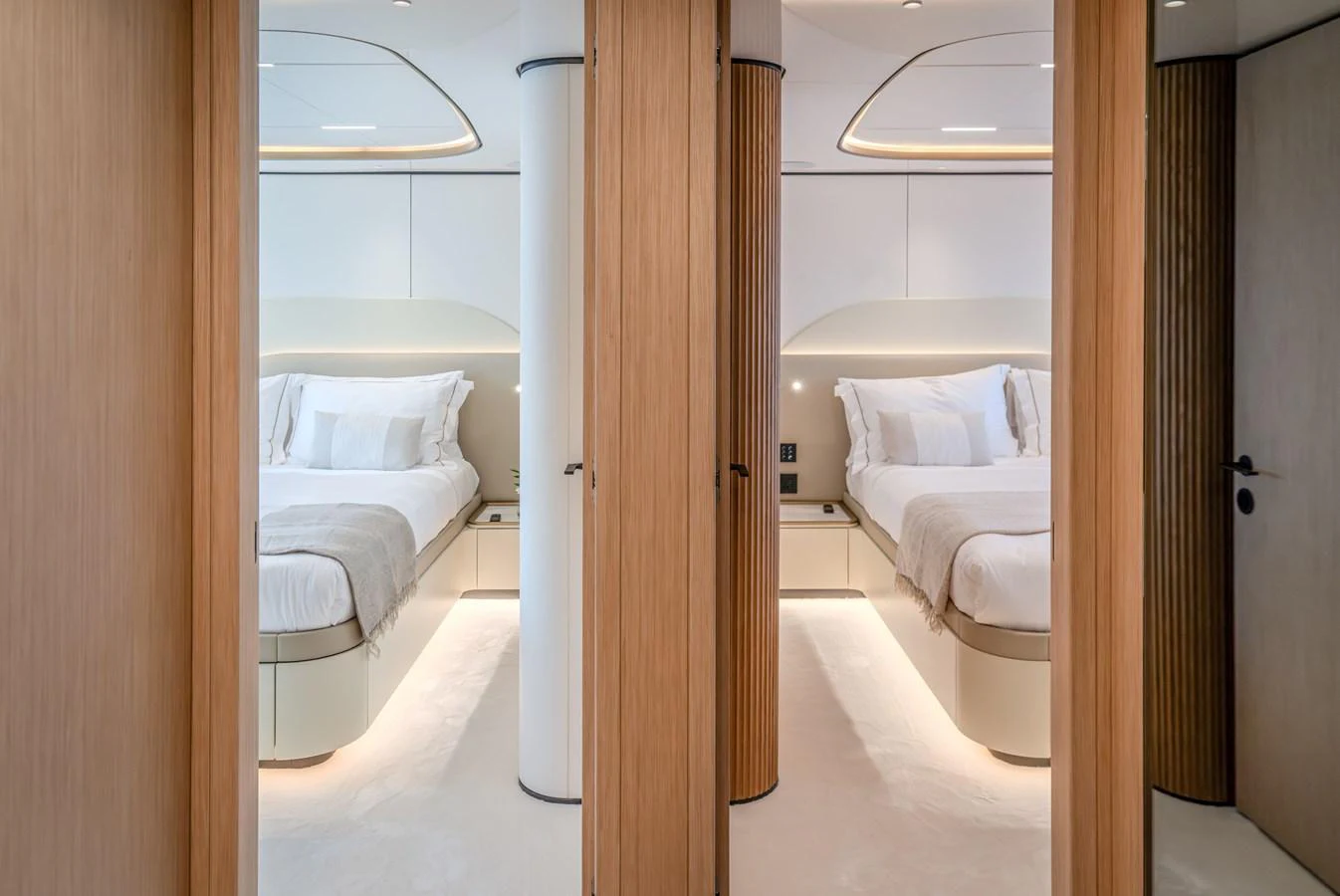 The image showcases a luxurious stateroom with elegant bedding and modern design elements. aboard 100 TERRACE ON-ORDER Yacht for Sale