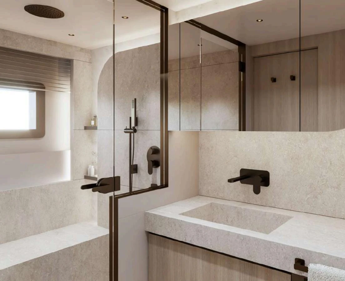 A modern and elegant yacht bathroom with sleek fixtures and a minimalist design. aboard NOMAD 101 ON-ORDER Yacht for Sale