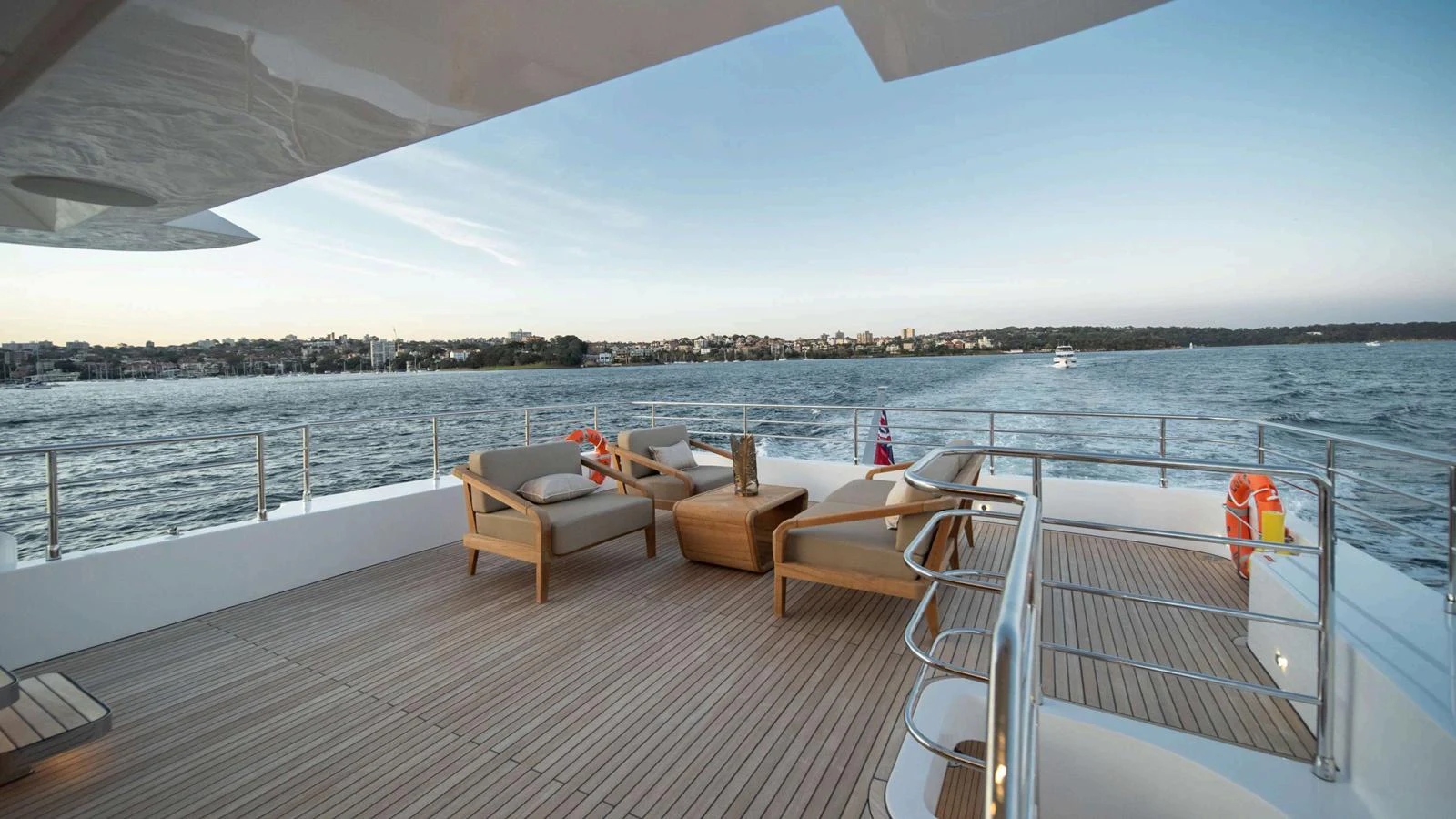 The aft deck offers a spacious and serene area for relaxation with comfortable seating and stunning views of the water. aboard NOMAD 101 ON-ORDER Yacht for Sale