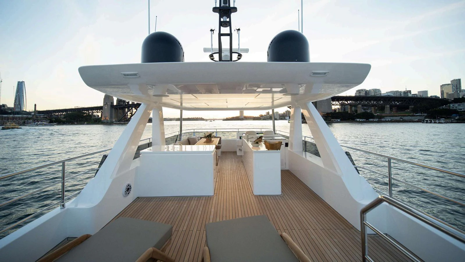 The flybridge offers a spacious and luxurious area with ample seating and stunning views. aboard NOMAD 101 ON-ORDER Yacht for Sale