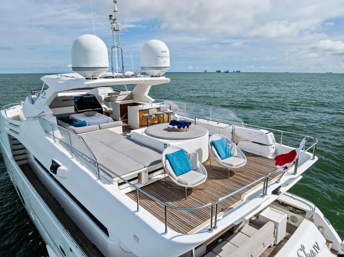 The yacht's sundeck offers luxurious lounging areas with stunning ocean views. aboard SHA SHA SHA IV Yacht for Sale