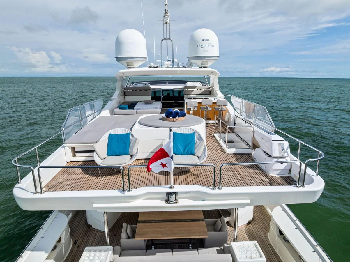 The spacious aft deck offers luxurious lounging areas with stunning ocean views. aboard SHA SHA SHA IV Yacht for Sale