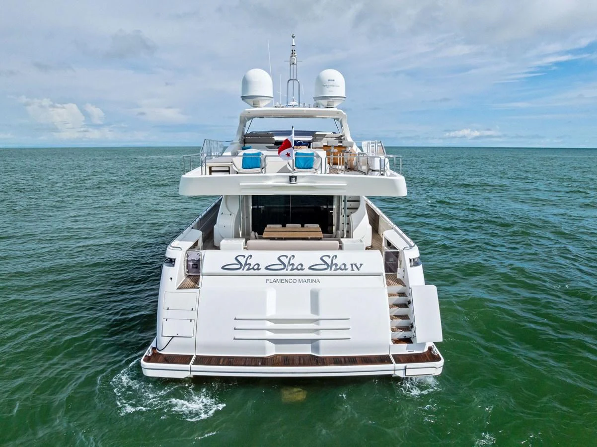 The yacht's aft deck offers a spacious and inviting area for relaxation and entertainment on the open water. aboard SHA SHA SHA IV Yacht for Sale