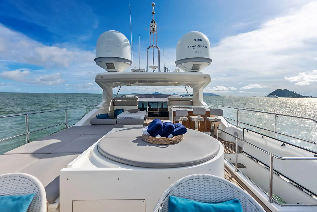 The sundeck offers a luxurious space with ample seating and stunning ocean views. aboard SHA SHA SHA IV Yacht for Sale
