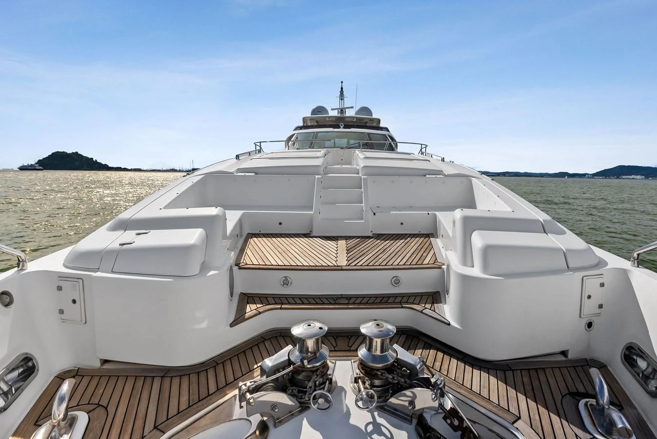 The foredeck of the yacht features spacious lounging areas with a beautiful view of the water. aboard SHA SHA SHA IV Yacht for Sale
