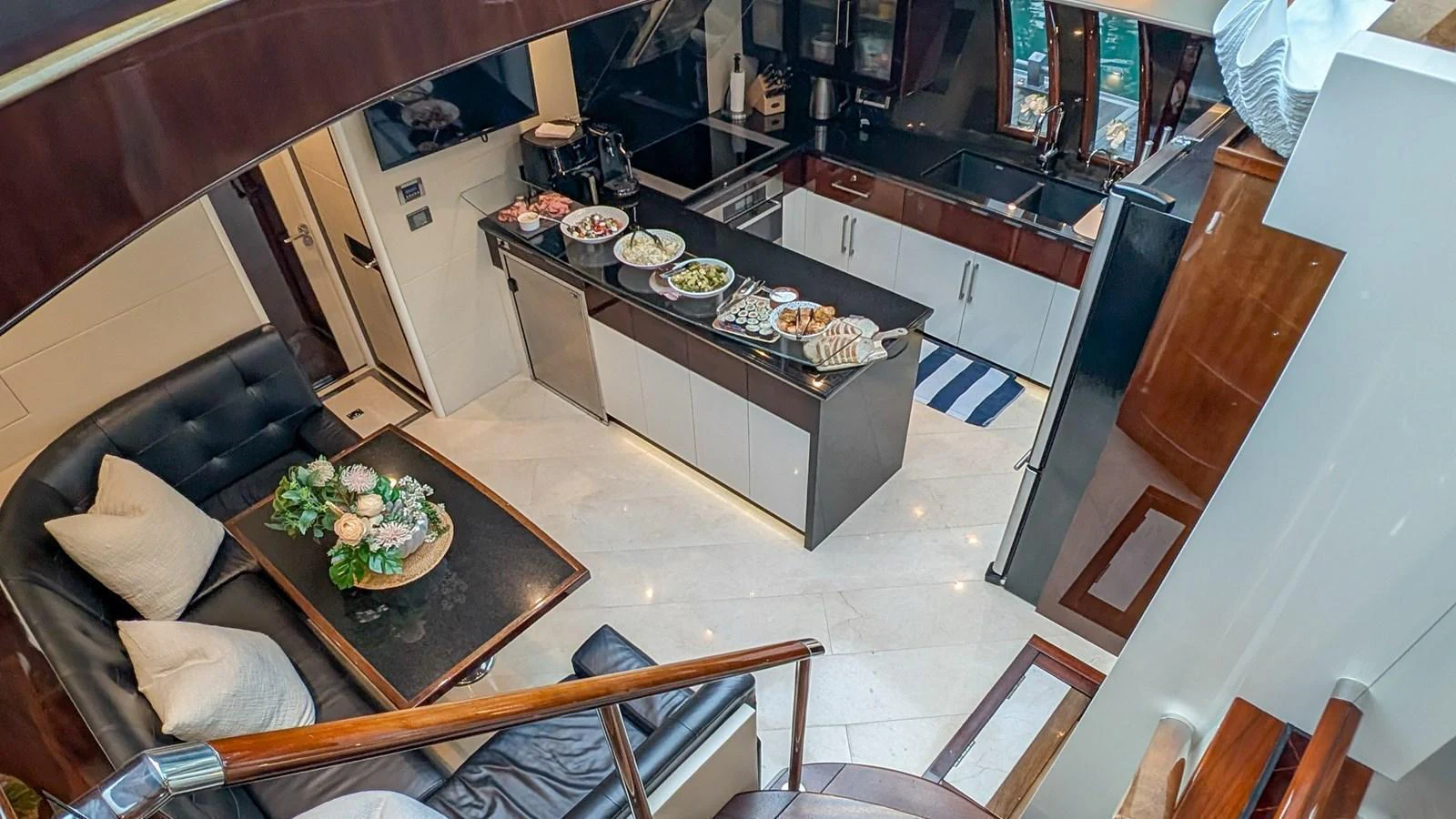 The yacht's galley is well-equipped with modern appliances and a comfortable dining area. aboard LA MAR Yacht for Sale