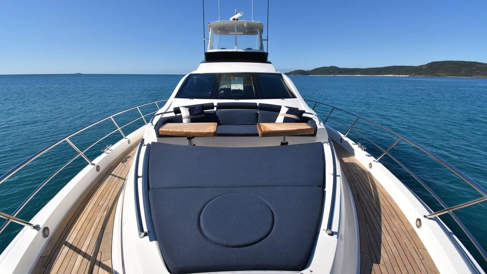 The yacht's foredeck features luxurious sun pads and a stunning view of the open sea. aboard LA MAR Yacht for Sale