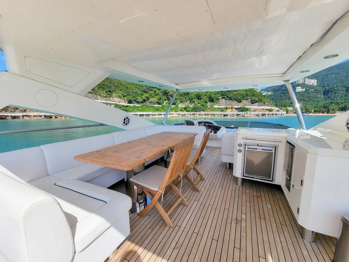 a room with a table and chairs aboard 2008 SUNSEEKER 90  @ ACAPULCO Yacht for Sale