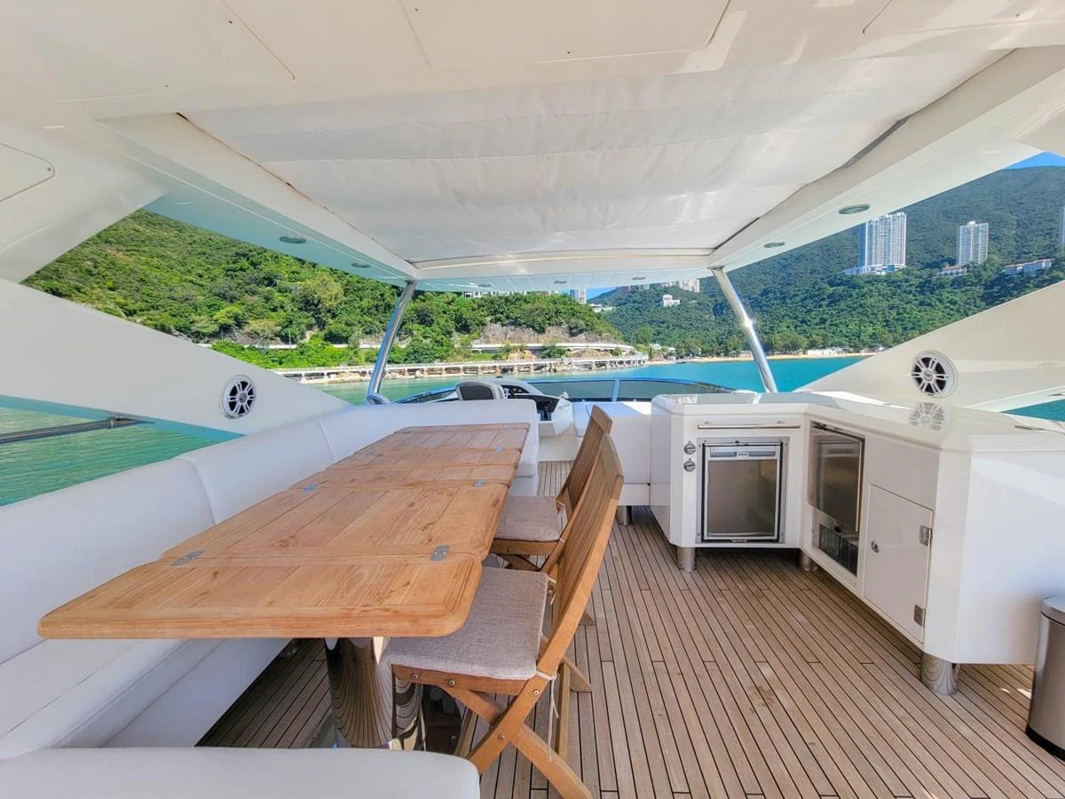 a room with a table and chairs aboard 2008 SUNSEEKER 90  @ ACAPULCO Yacht for Sale