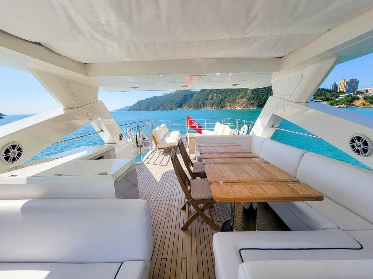 a room with a table and chairs aboard 2008 SUNSEEKER 90  @ ACAPULCO Yacht for Sale