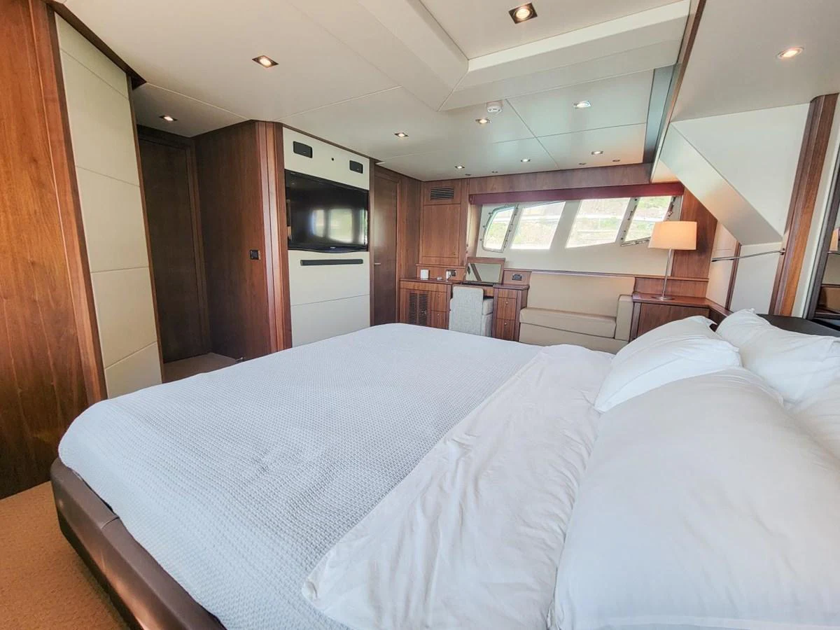 a bed in a room aboard 2008 SUNSEEKER 90  @ ACAPULCO Yacht for Sale