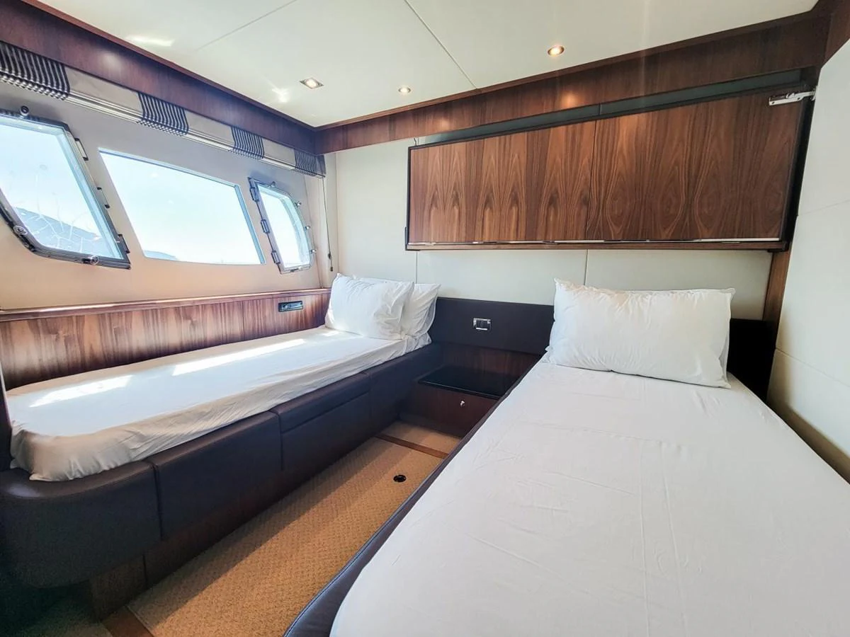 a room with two beds aboard 2008 SUNSEEKER 90  @ ACAPULCO Yacht for Sale