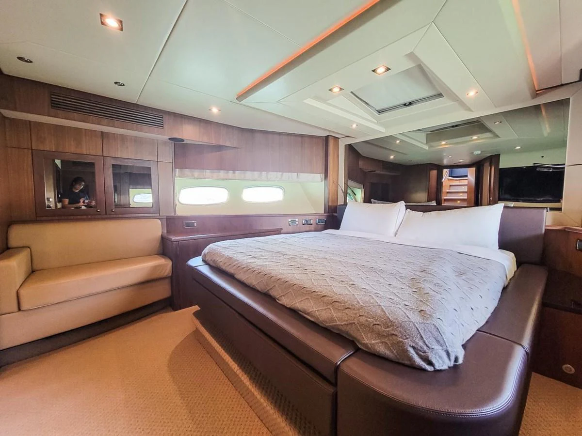 a bed in a room aboard 2008 SUNSEEKER 90  @ ACAPULCO Yacht for Sale