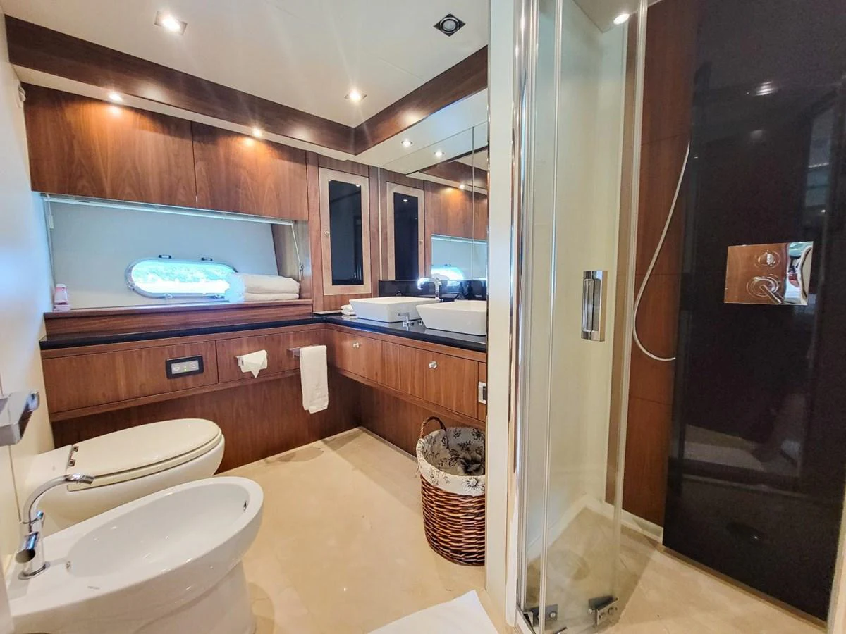 a bathroom with a sink and a toilet aboard 2008 SUNSEEKER 90  @ ACAPULCO Yacht for Sale