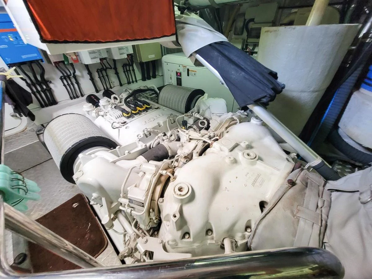 a car engine with a blue hood aboard 2008 SUNSEEKER 90  @ ACAPULCO Yacht for Sale