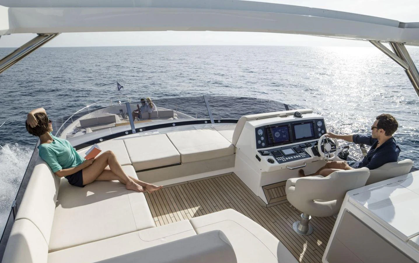 The flybridge offers a spacious and luxurious area for relaxation and navigation with panoramic ocean views. aboard SVETLANA Yacht for Sale