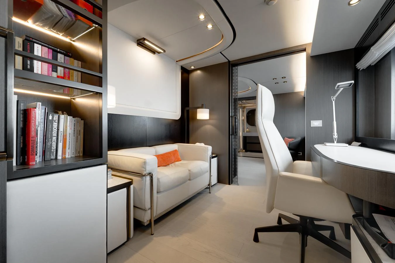 The yacht's salon features a modern and cozy seating area with a sleek design. aboard L.A.U.L. Yacht for Sale