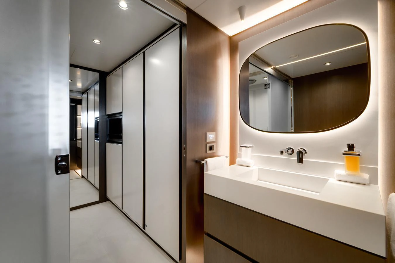 A sleek and modern yacht bathroom with contemporary fixtures and ample lighting. aboard L.A.U.L. Yacht for Sale