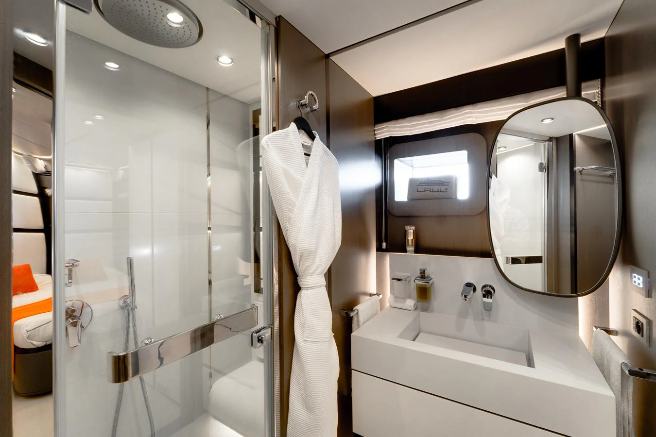 The yacht's bathroom features modern fixtures and a sleek design, offering a luxurious and comfortable space. aboard L.A.U.L. Yacht for Sale