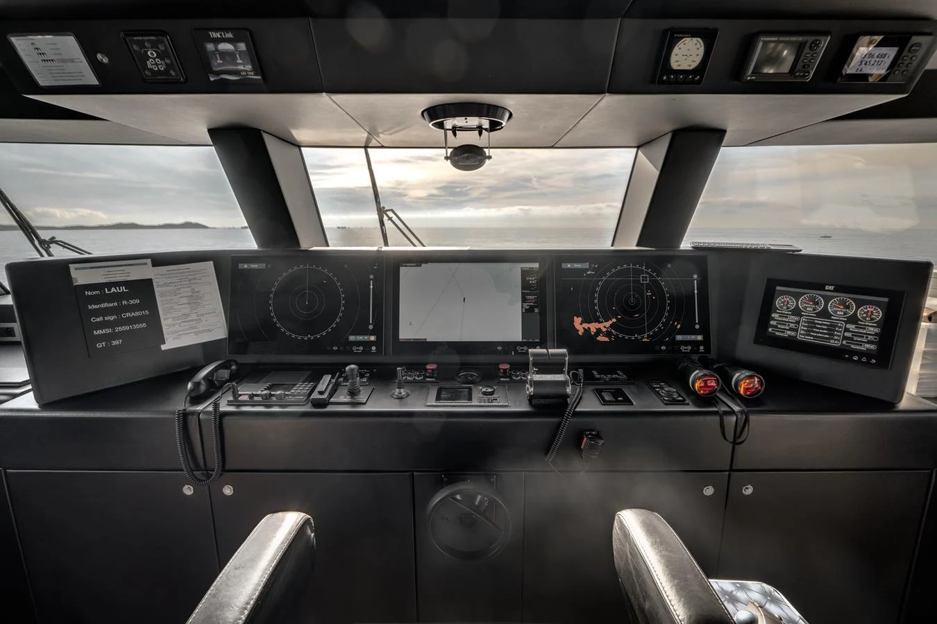 The helm station offers a sophisticated and modern control center with advanced navigation equipment. aboard L.A.U.L. Yacht for Sale