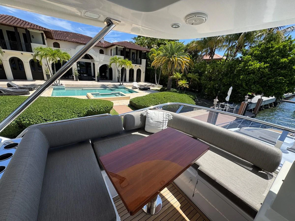 a patio with a pool and a slide aboard XAX66046F718 Yacht for Sale