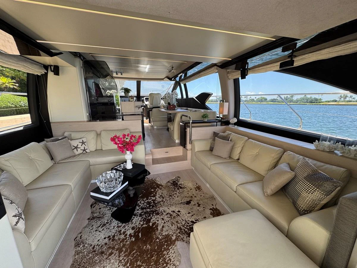 a living room with a large window aboard XAX66046F718 Yacht for Sale