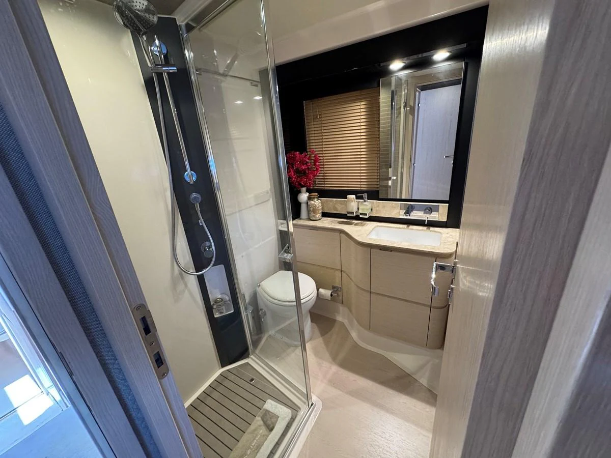a bathroom with a sink and a toilet aboard XAX66046F718 Yacht for Sale
