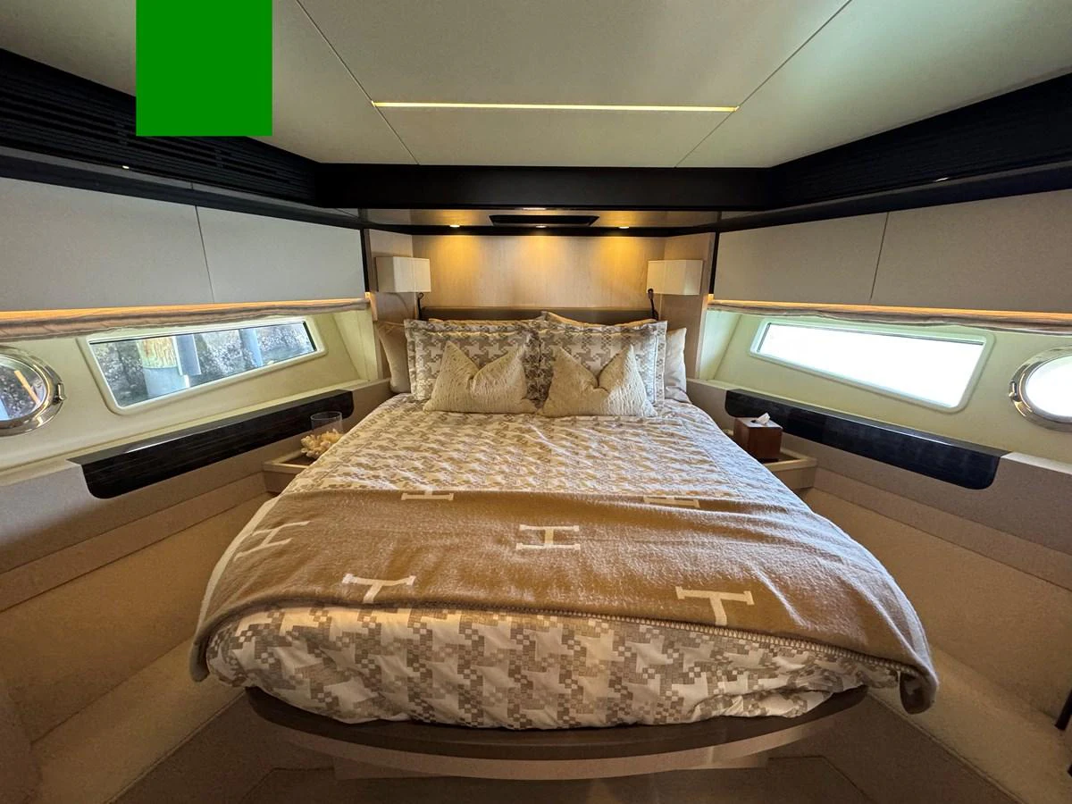 a bed with a window aboard XAX66046F718 Yacht for Sale