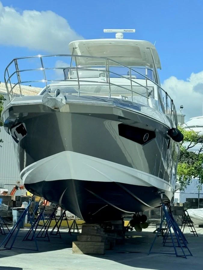 a large white boat aboard XAX66046F718 Yacht for Sale