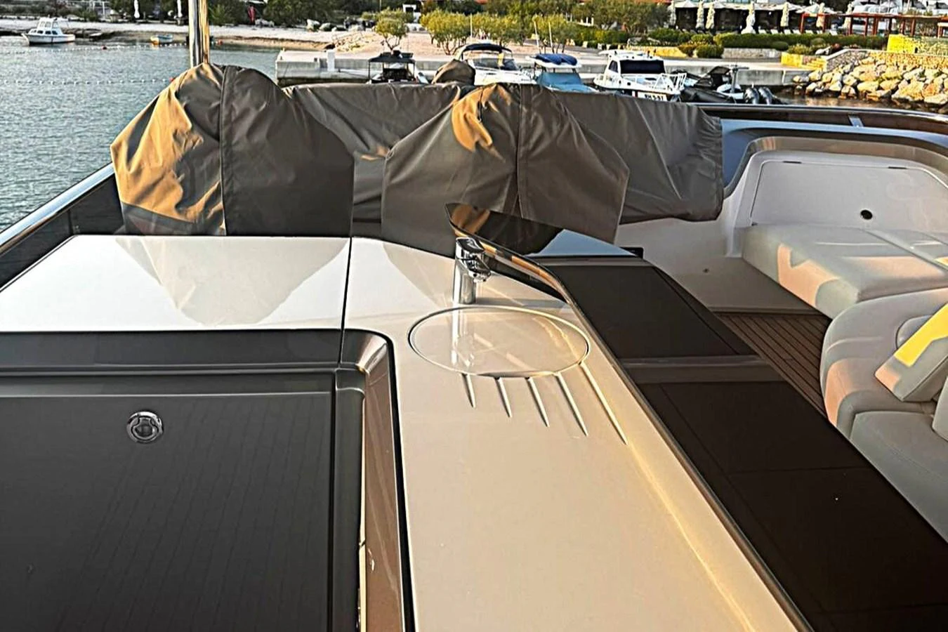 a boat with a cover on the front aboard SOLOMON Yacht for Sale