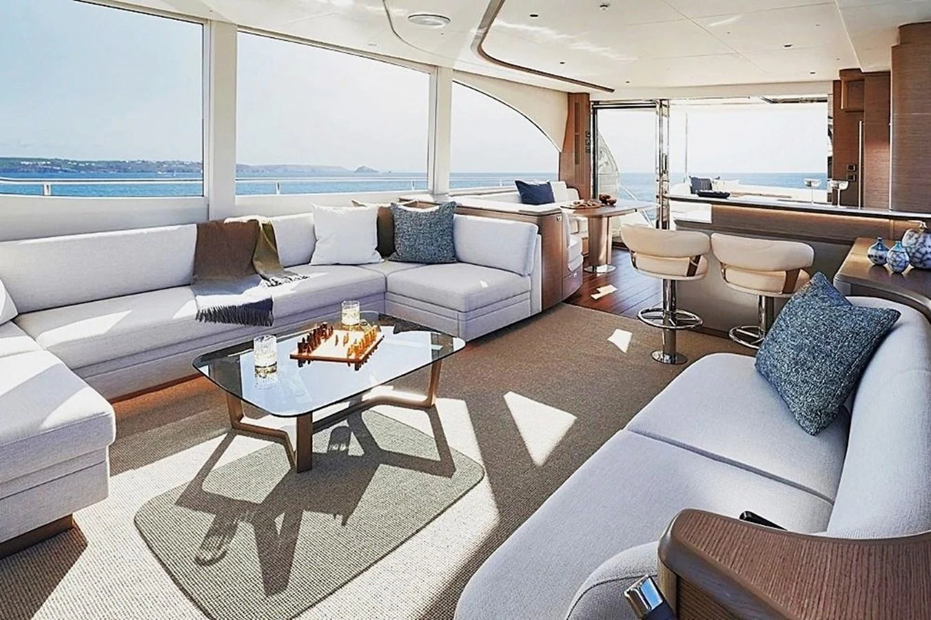 a living room with a couch and a coffee table aboard SOLOMON Yacht for Sale