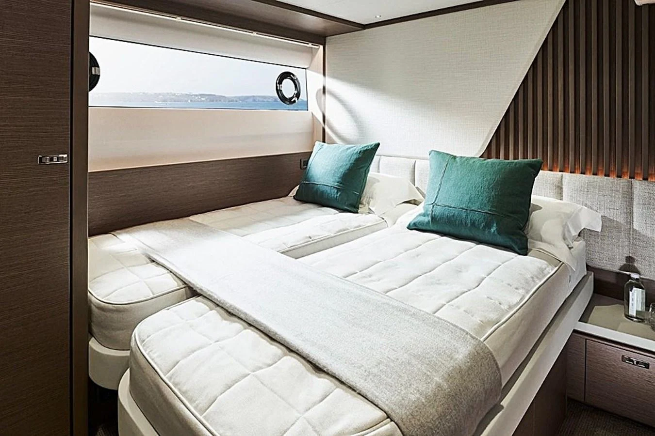 a bed with pillows on it aboard SOLOMON Yacht for Sale